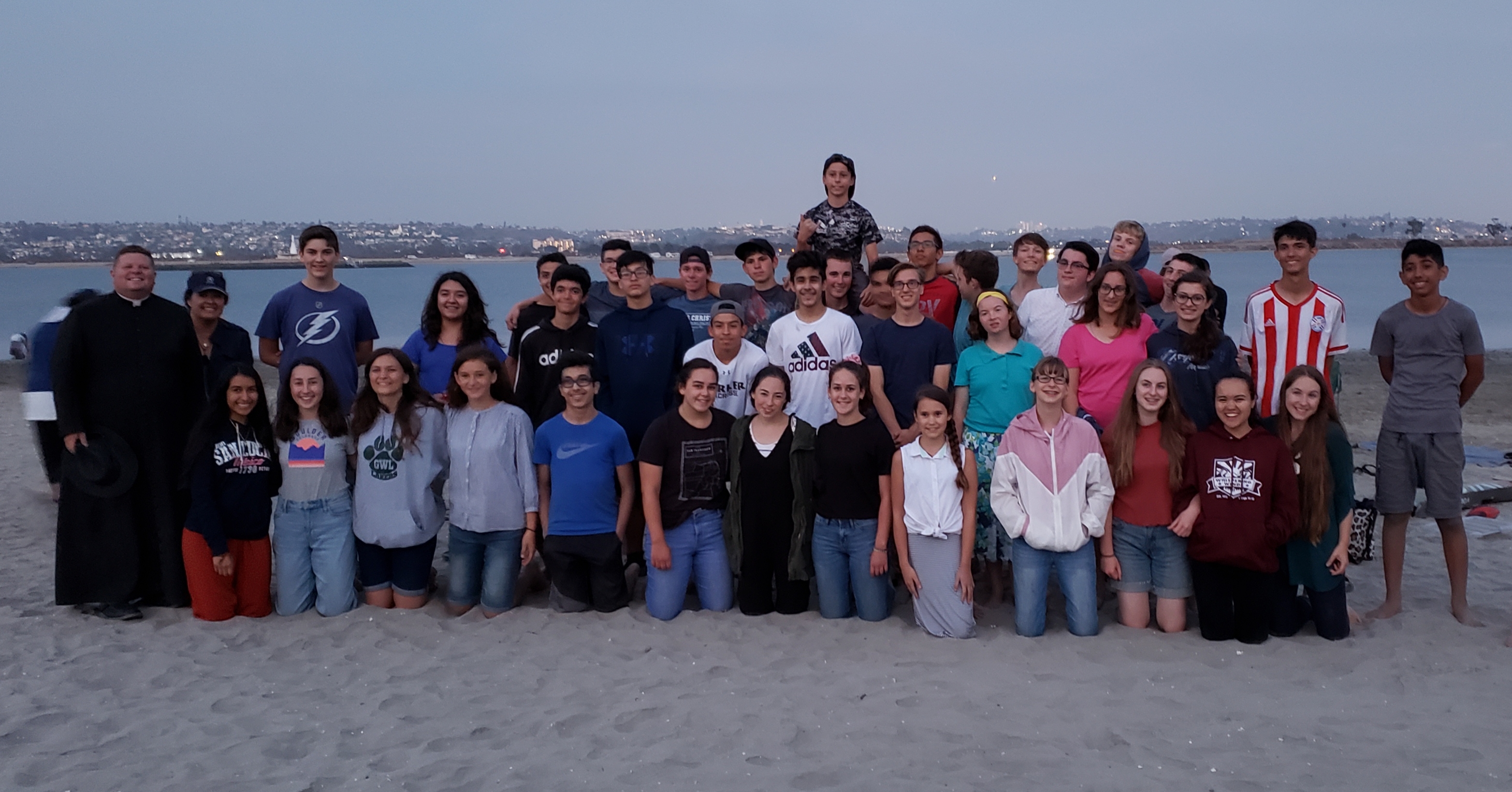 A group picture of the group at one of the beach outings