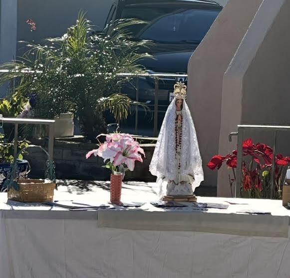 St Anne's Women's Group snapshots of a table with a statue of Our Lady